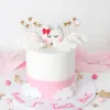 pink first tooth cake