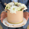 beige anniversary cake